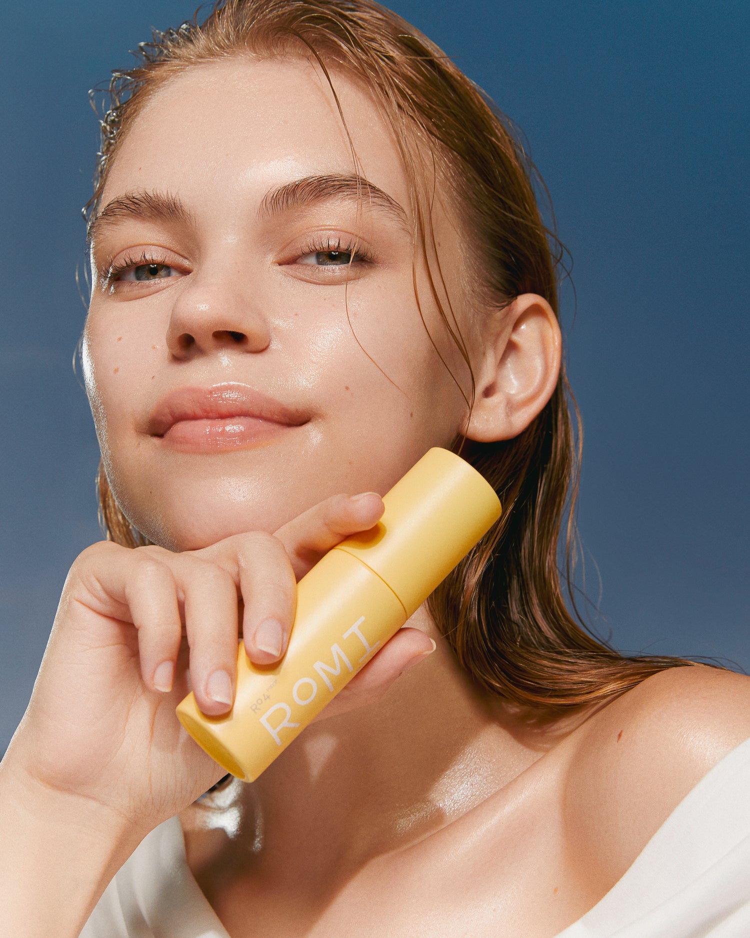 ROMI Beauty Skin Oasis Serum Mist bottle, 3-in-1 toner, serum, and face mist for hydrated skin.